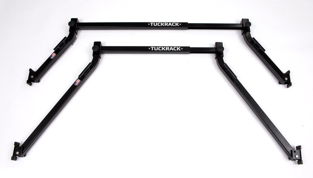 Two black TuckRack racks on a white background