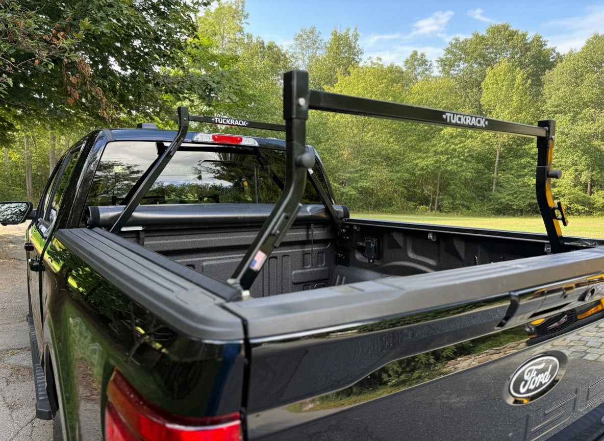 Ford truck with a TuckRack in the forested area